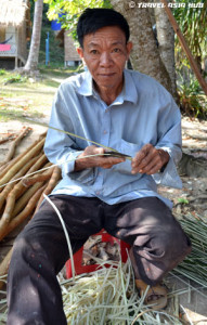 Man Making Beach Huts on Rabbit Island Cambodia